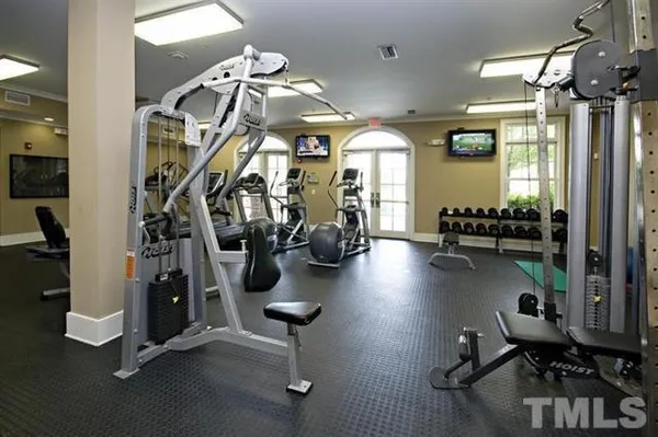 a view of house with yard and entertaining space