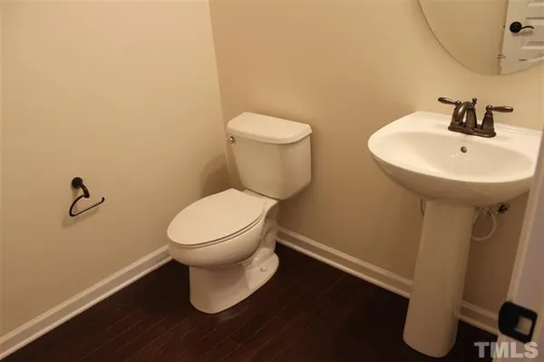 a bathroom with a toilet and a sink