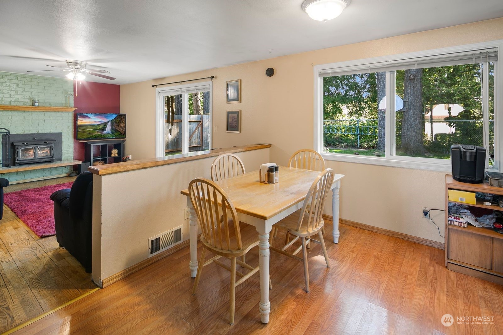 15612 119th Avenue Northeast Bothell, WA 98011 - Photo 19 of 32 a dining room with furniture and wooden floor