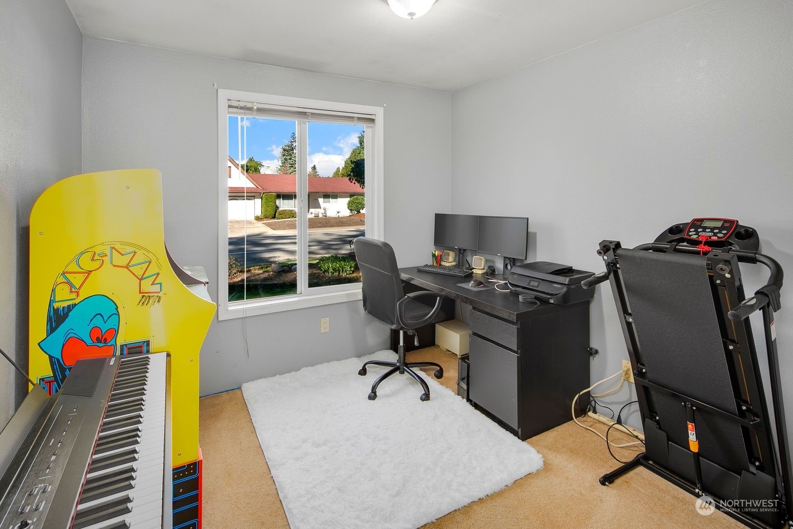 15612 119th Avenue Northeast Bothell, WA 98011 - Photo 25 of 32 a view of a workspace with furniture and a window