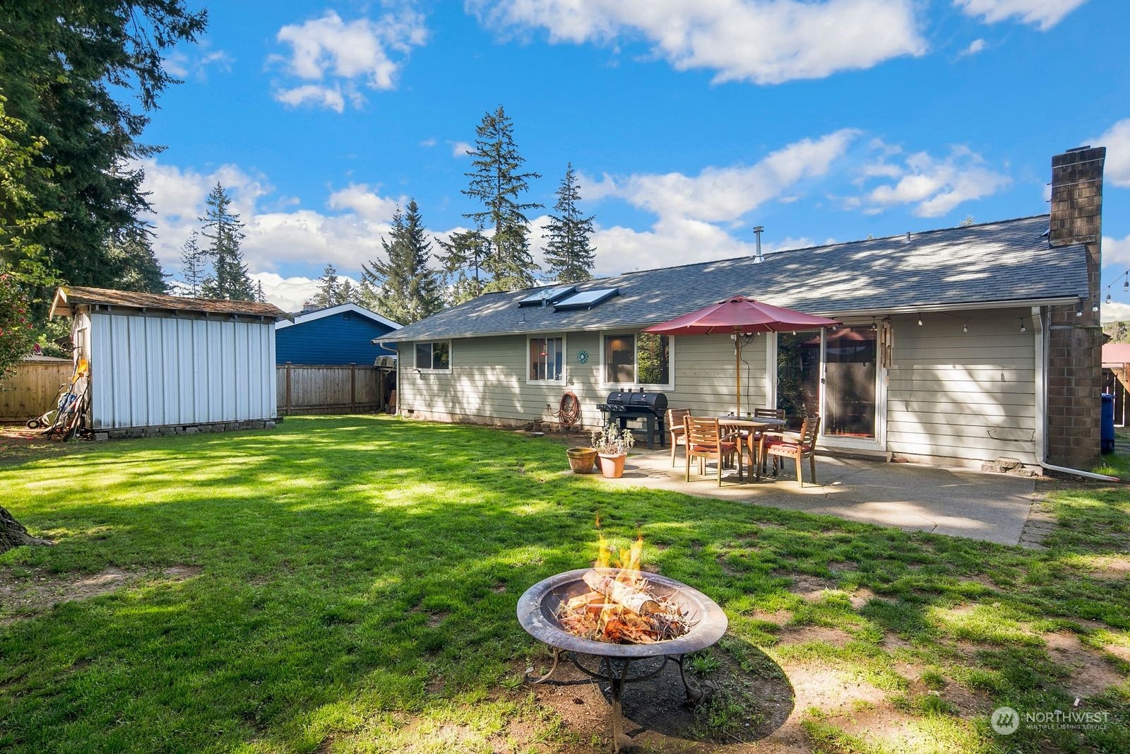 15612 119th Avenue Northeast Bothell, WA 98011 - Photo 27 of 32 a view of a house with swimming pool and porch
