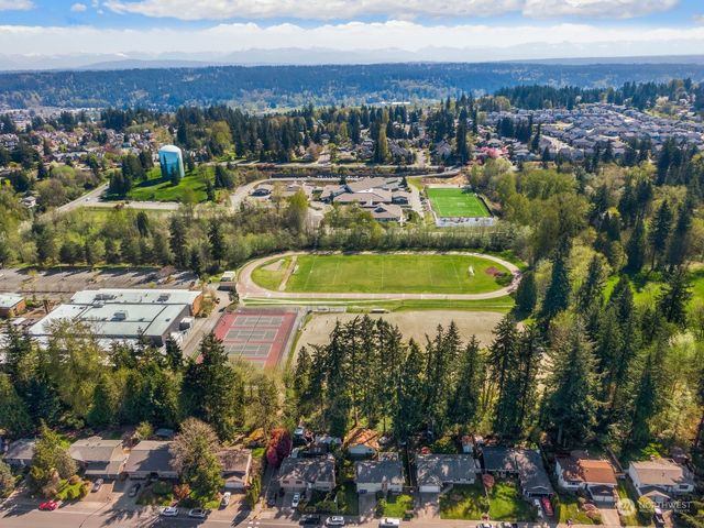 a view of a swimming pool and lake view