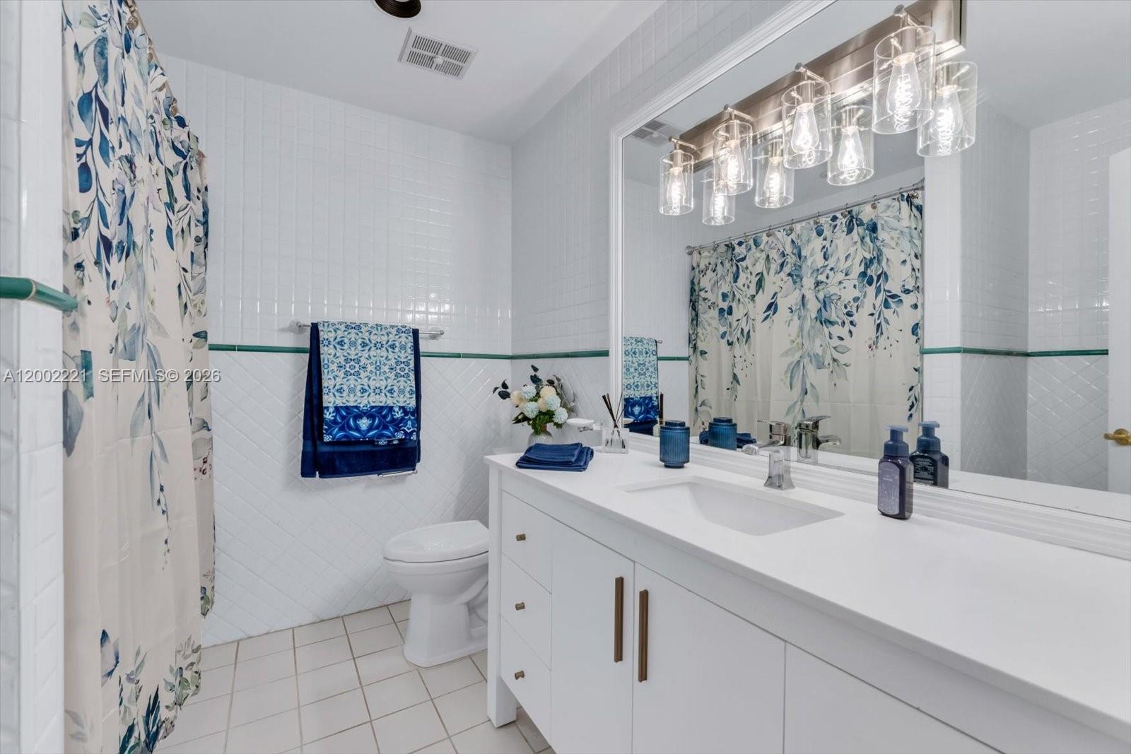 9941 Southwest 143rd Street Miami, FL 33176 - Photo 23 of 48 Hall bathroom