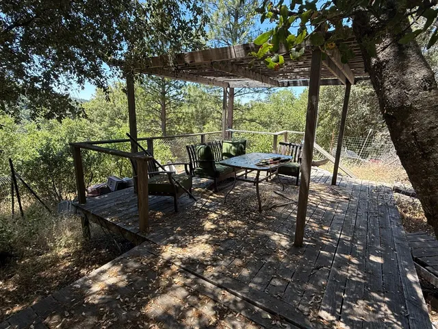 a view of a yard covered with snow in the background
