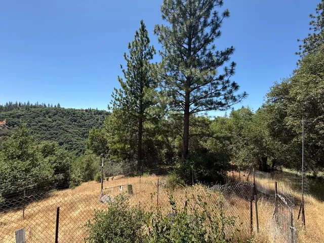 a view of snow on the road