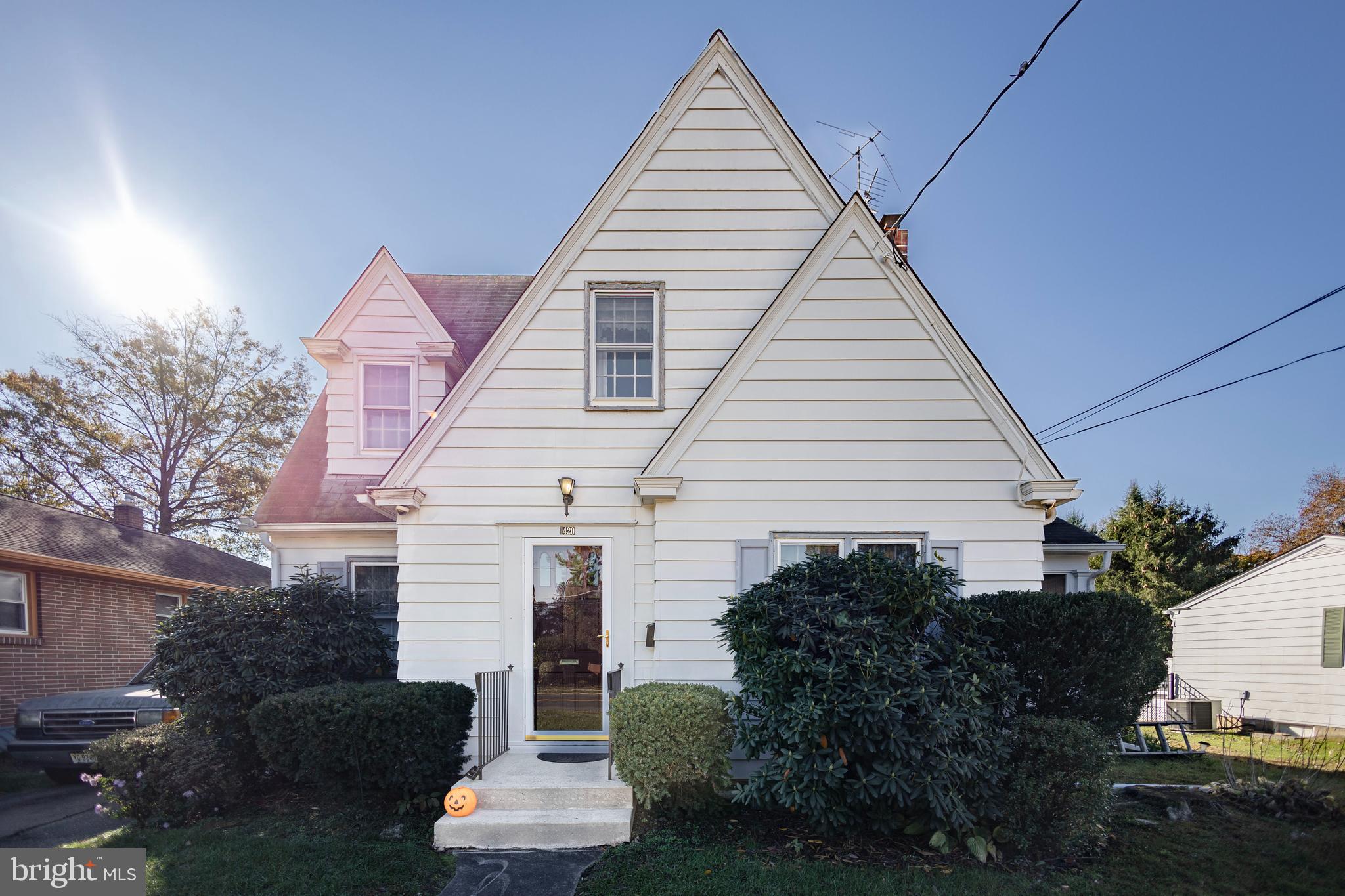 1420 Prospect Ridge Boulevard Haddon Heights, NJ 08035 - Photo 1 of 29 a front view of a house with a yard
