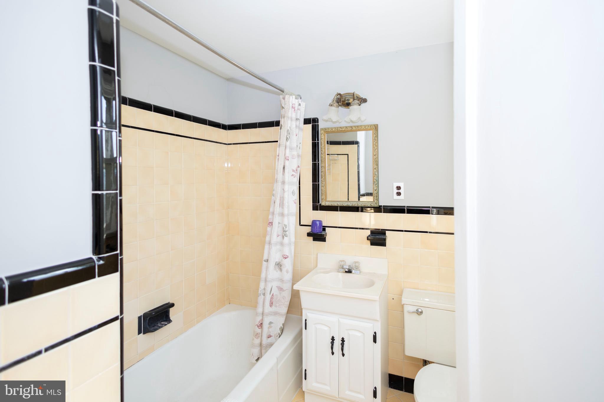 1420 Prospect Ridge Boulevard Haddon Heights, NJ 08035 - Photo 17 of 29 a bathroom with a bathtub sink mirror and vanity