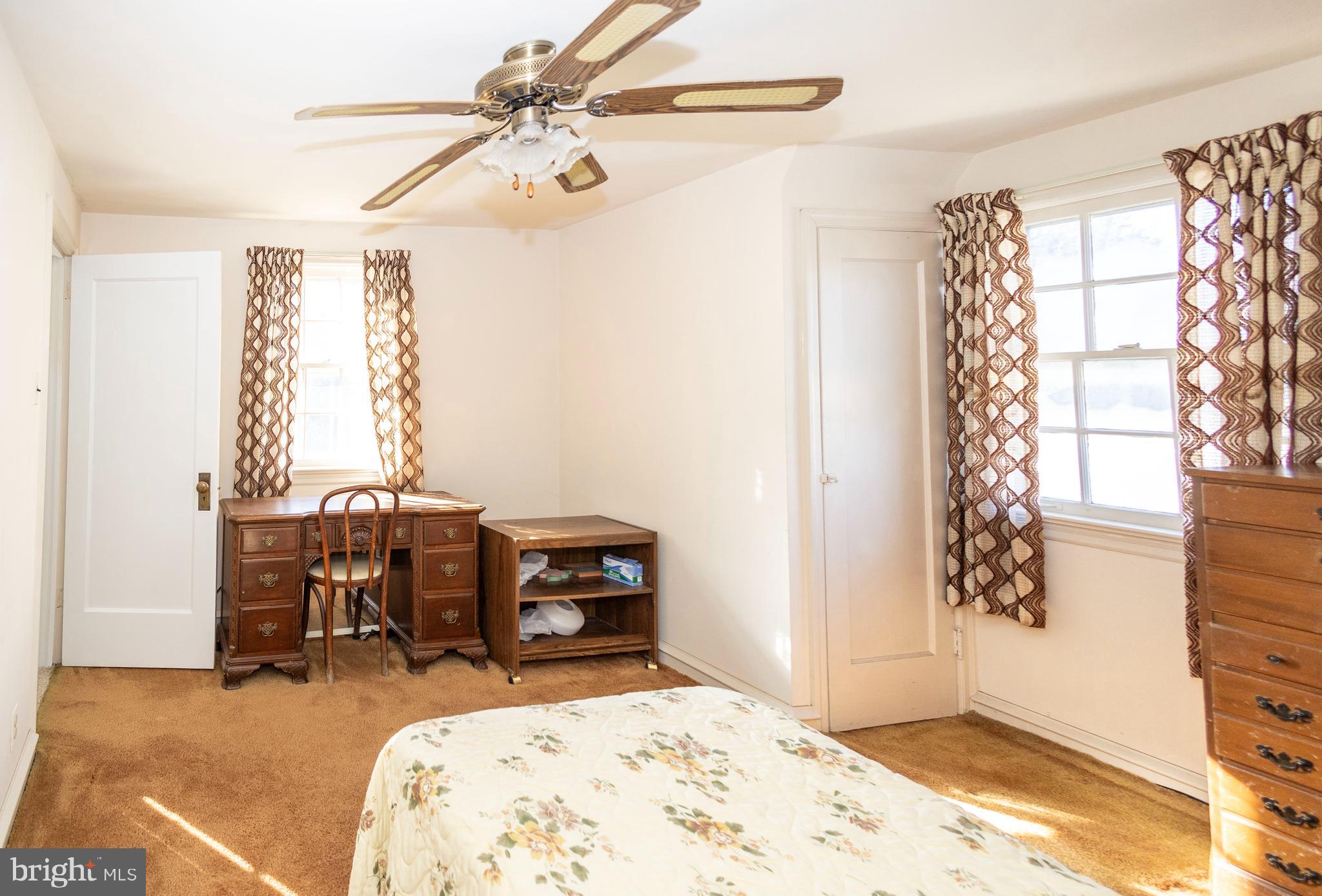 1420 Prospect Ridge Boulevard Haddon Heights, NJ 08035 - Photo 18 of 29 a bed room with a bed and a table