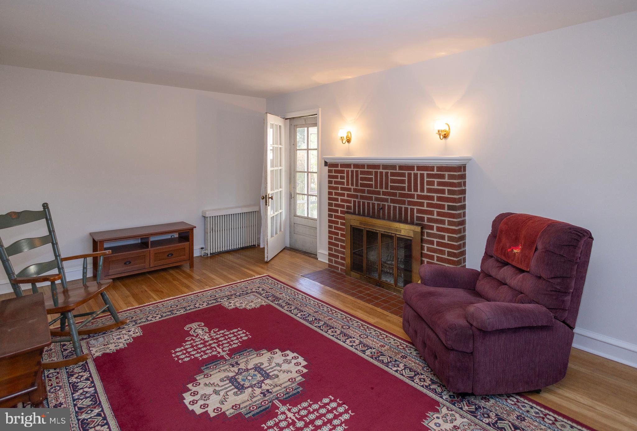 1420 Prospect Ridge Boulevard Haddon Heights, NJ 08035 - Photo 2 of 29 a living room with furniture and a fireplace