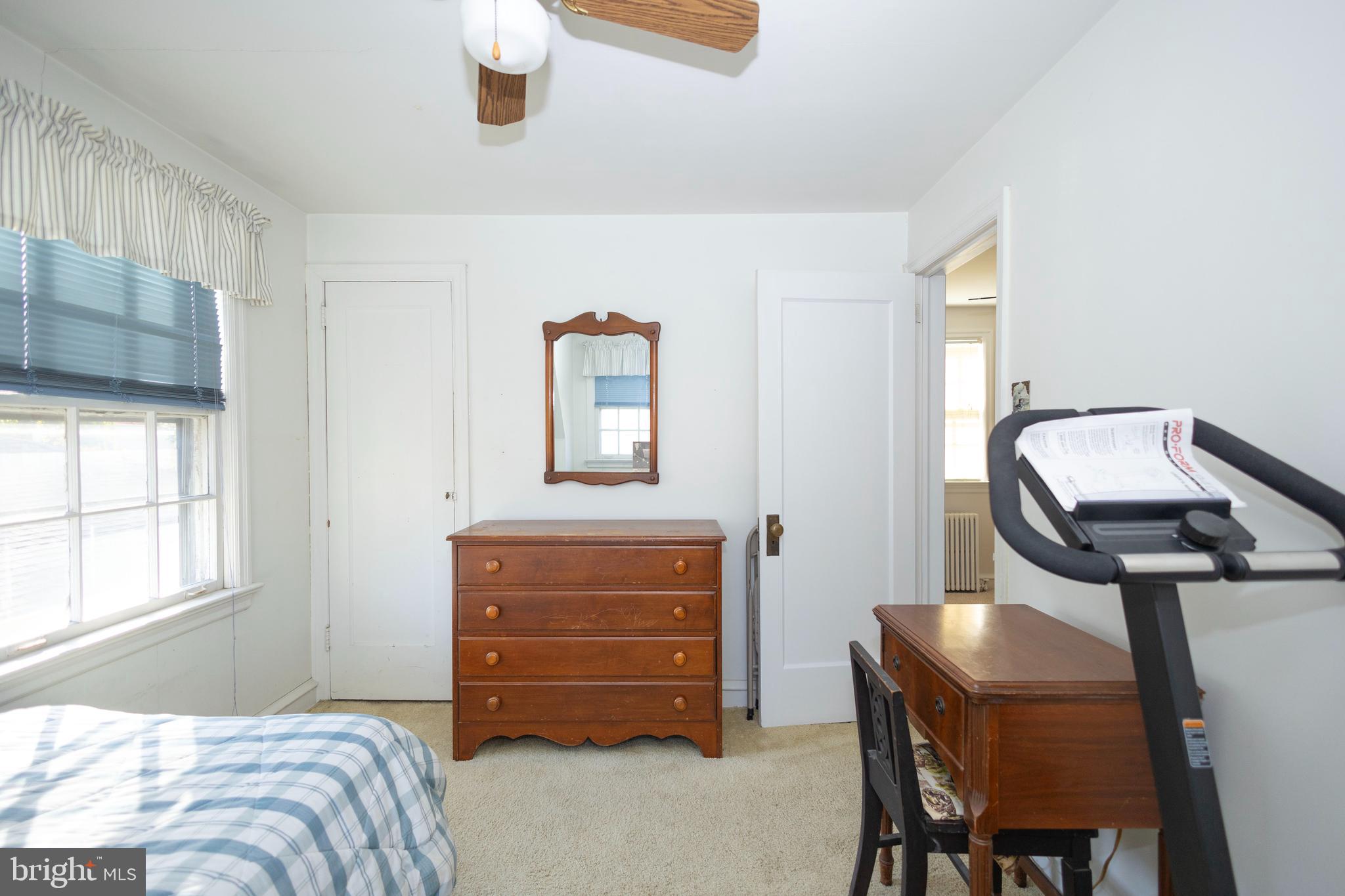 1420 Prospect Ridge Boulevard Haddon Heights, NJ 08035 - Photo 21 of 29 a bedroom with a bed and a dresser next to a window