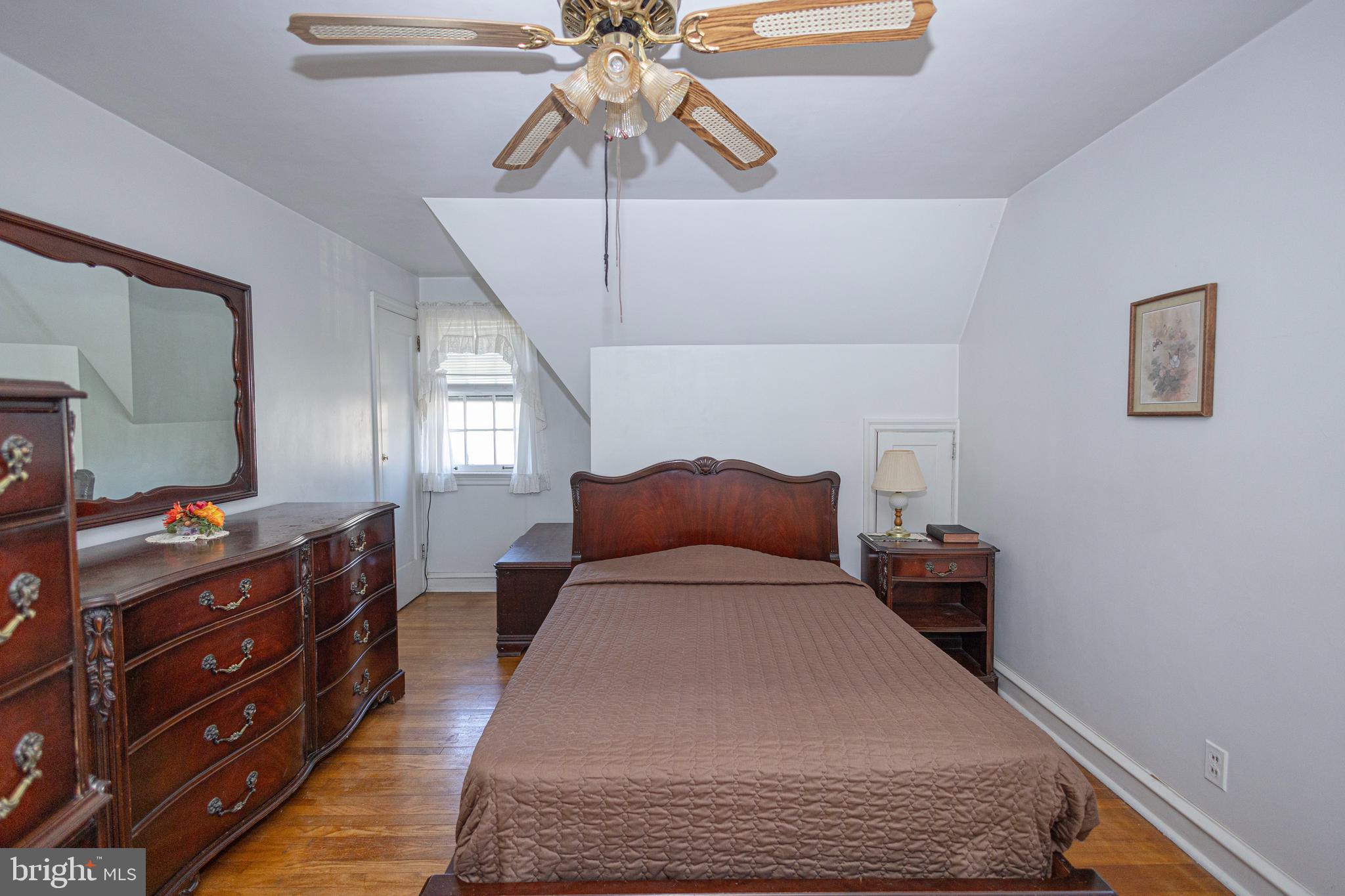 1420 Prospect Ridge Boulevard Haddon Heights, NJ 08035 - Photo 22 of 29 a bed room with a bed and a chandelier