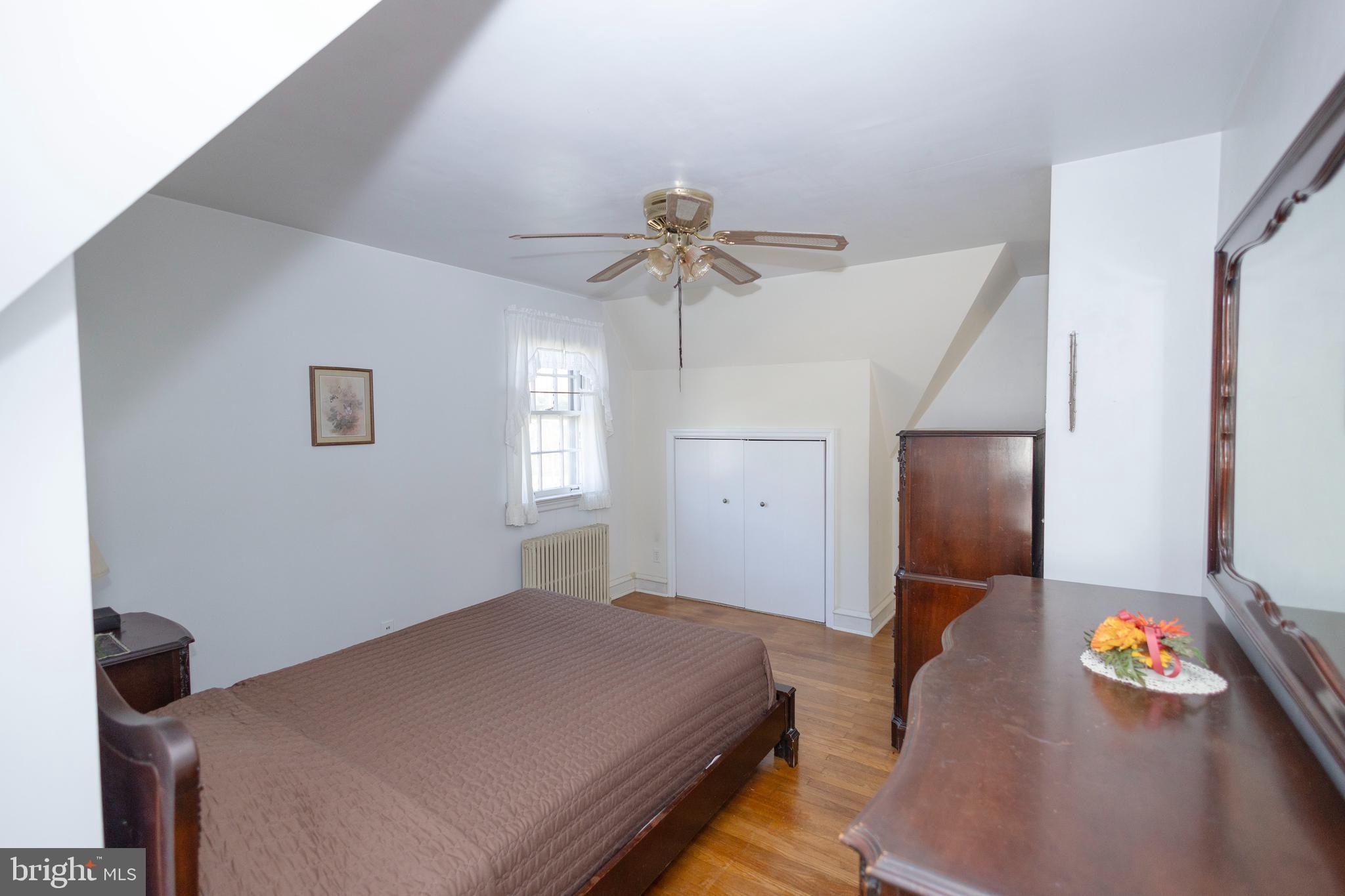 1420 Prospect Ridge Boulevard Haddon Heights, NJ 08035 - Photo 23 of 29 a bedroom with bed and a chandelier