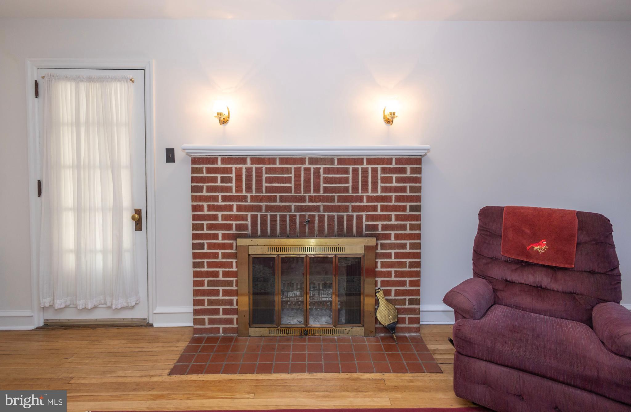 1420 Prospect Ridge Boulevard Haddon Heights, NJ 08035 - Photo 5 of 29 a living room with furniture and a fireplace