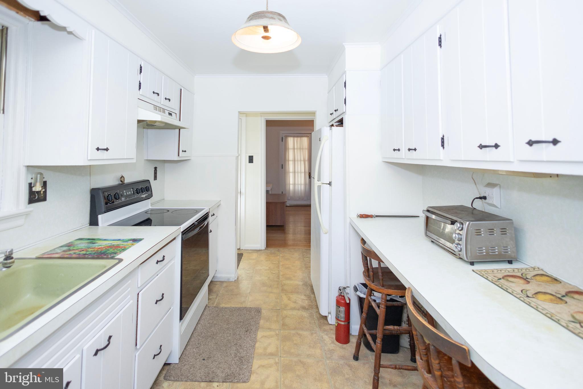 1420 Prospect Ridge Boulevard Haddon Heights, NJ 08035 - Photo 9 of 29 a kitchen with cabinets and appliances