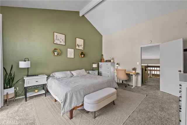 a large white bed in a white room