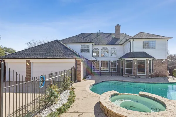 a view of a backyard of the house