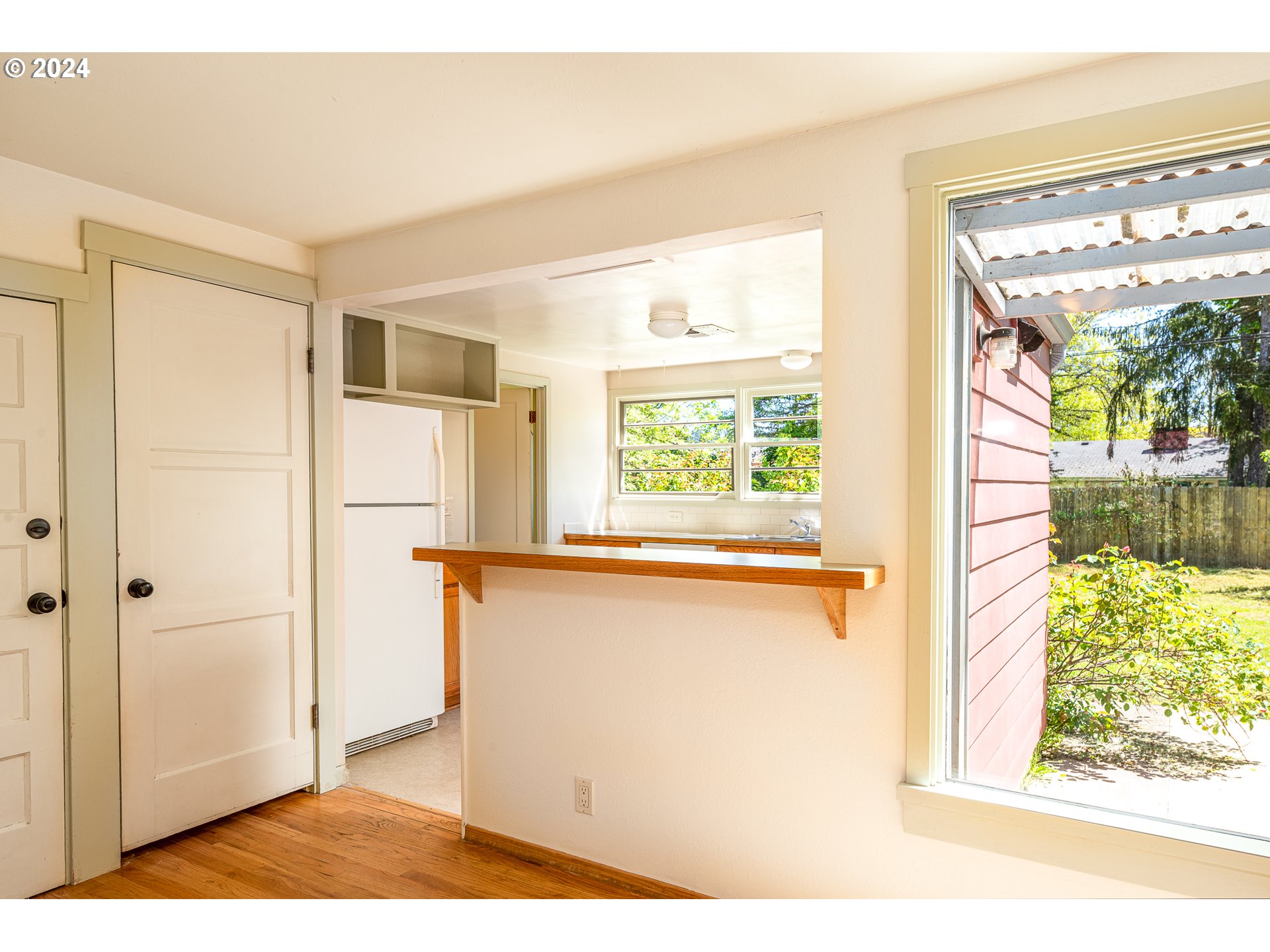 2915 Mill Street Eugene, OR 97405 - Photo 11 of 37 a view of a kitchen with a window