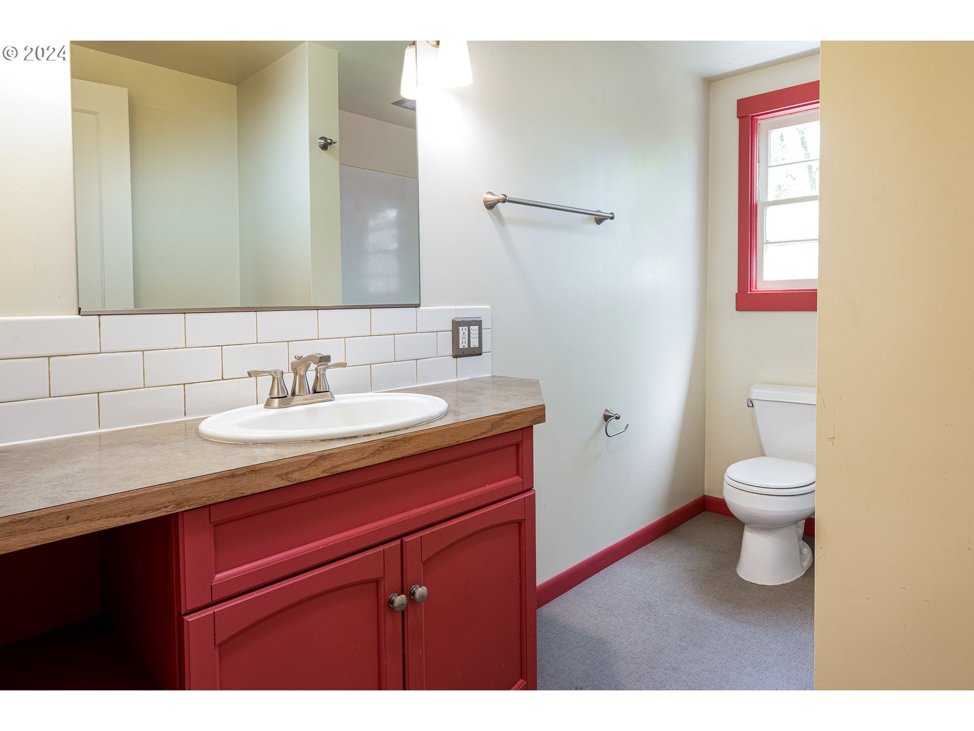 2915 Mill Street Eugene, OR 97405 - Photo 21 of 37 a bathroom with a sink vanity granite and toilet