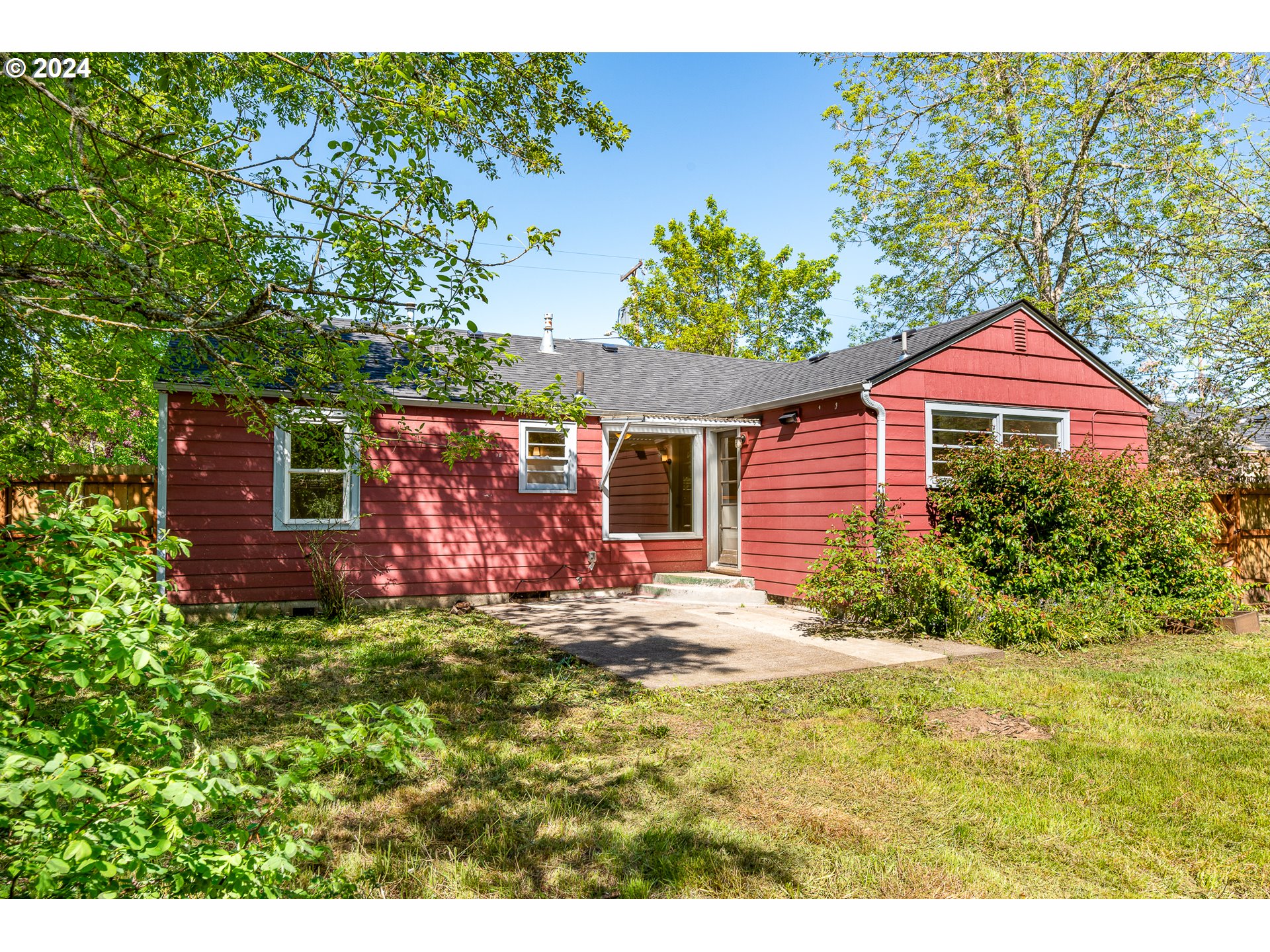 2915 Mill Street Eugene, OR 97405 - Photo 26 of 37 a front view of a house with a yard