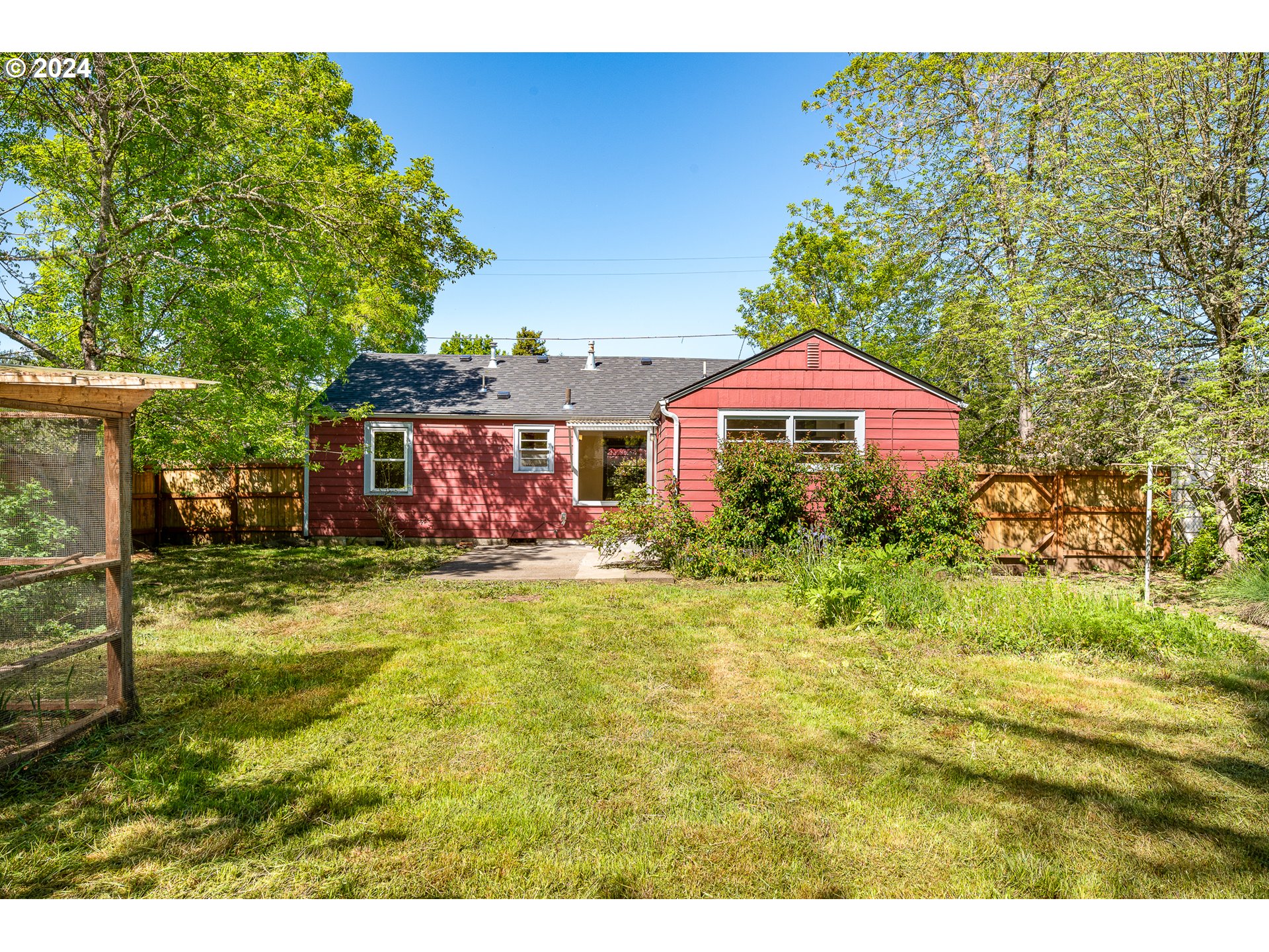2915 Mill Street Eugene, OR 97405 - Photo 27 of 37 a front view of house with yard and trees