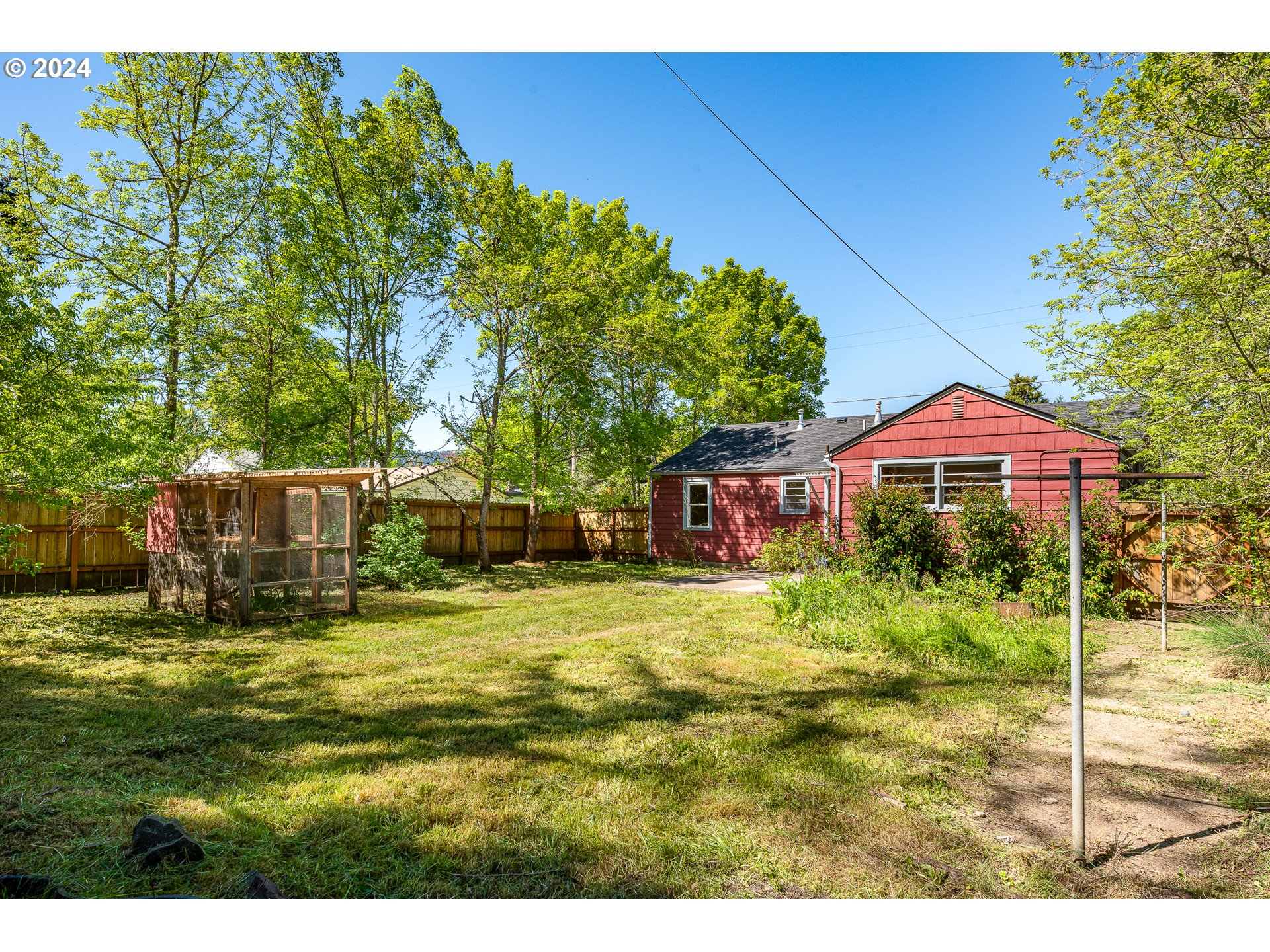 2915 Mill Street Eugene, OR 97405 - Photo 29 of 37 a view of a house with a yard