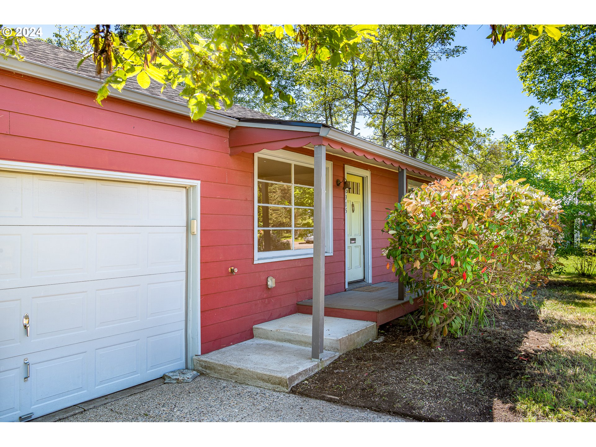 2915 Mill Street Eugene, OR 97405 - Photo 4 of 37 a small garden in the backyard of a house