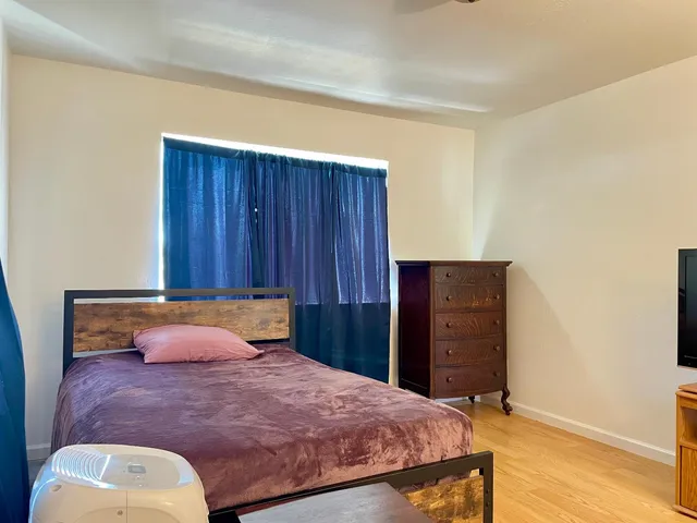 a house view with a backyard space