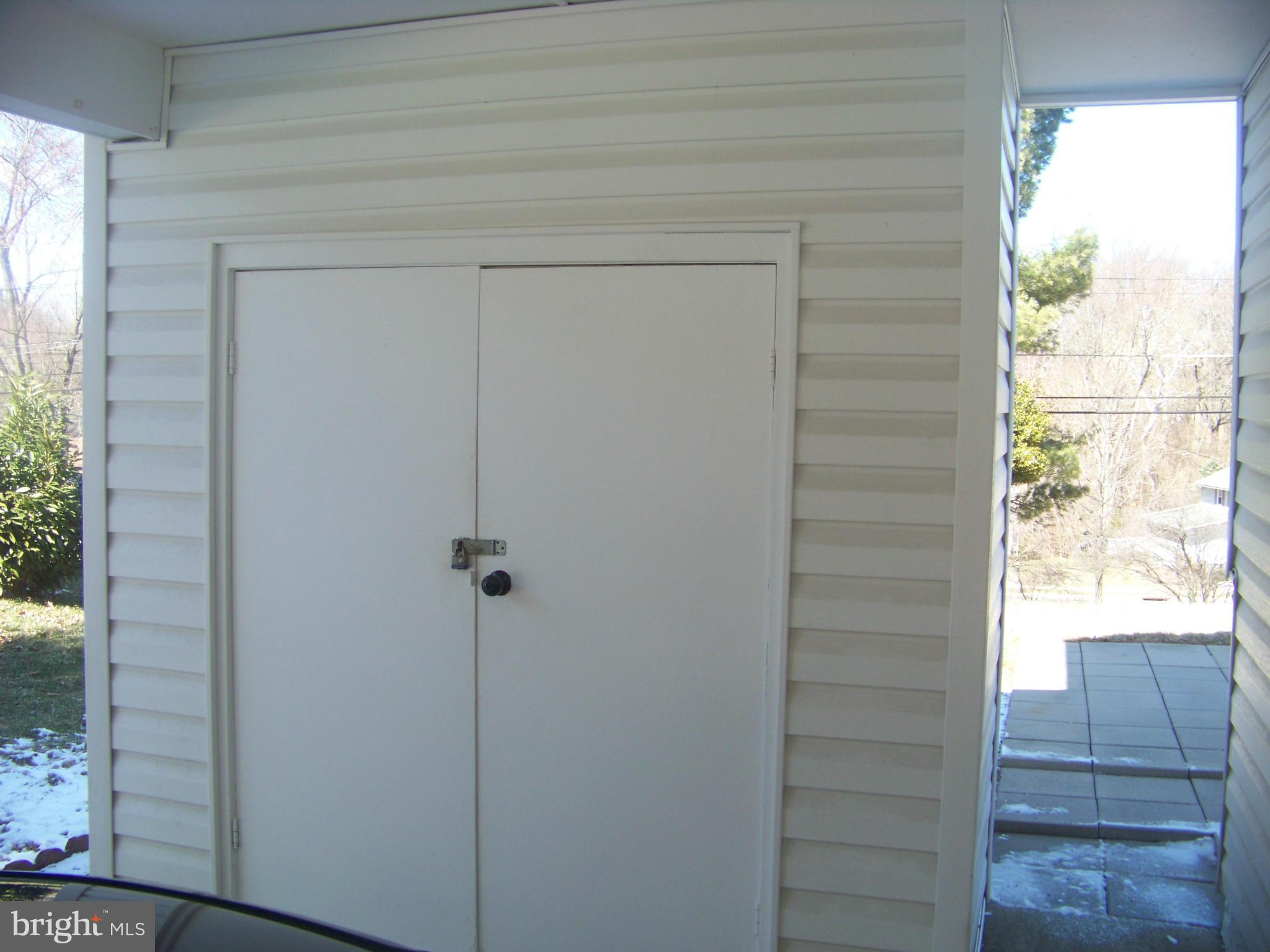922 Cromwell Bridge Road Towson, MD 21286 - Photo 4 of 14 Shed under carport