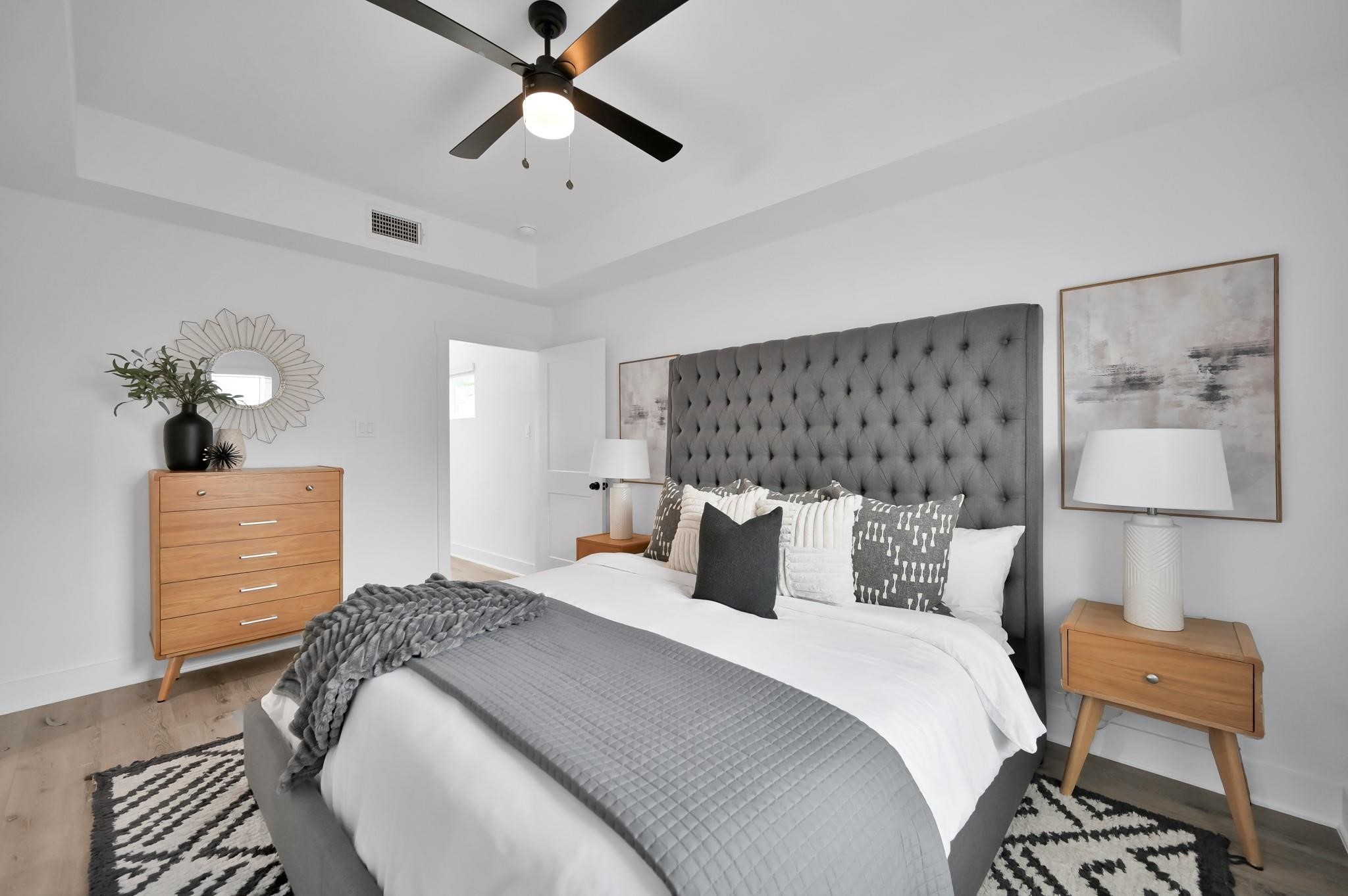 8017 A Cora Street Houston, TX 77088 - Photo 11 of 29 a bedroom with a bed and window