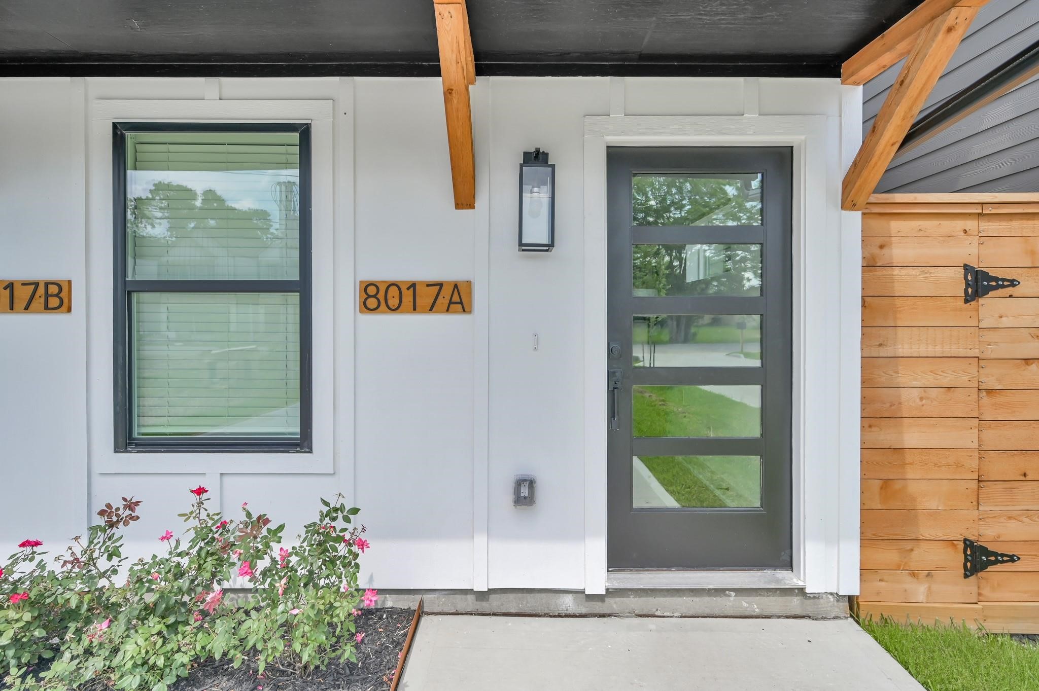 8017 A Cora Street Houston, TX 77088 - Photo 2 of 29 a front view of a house with a yard