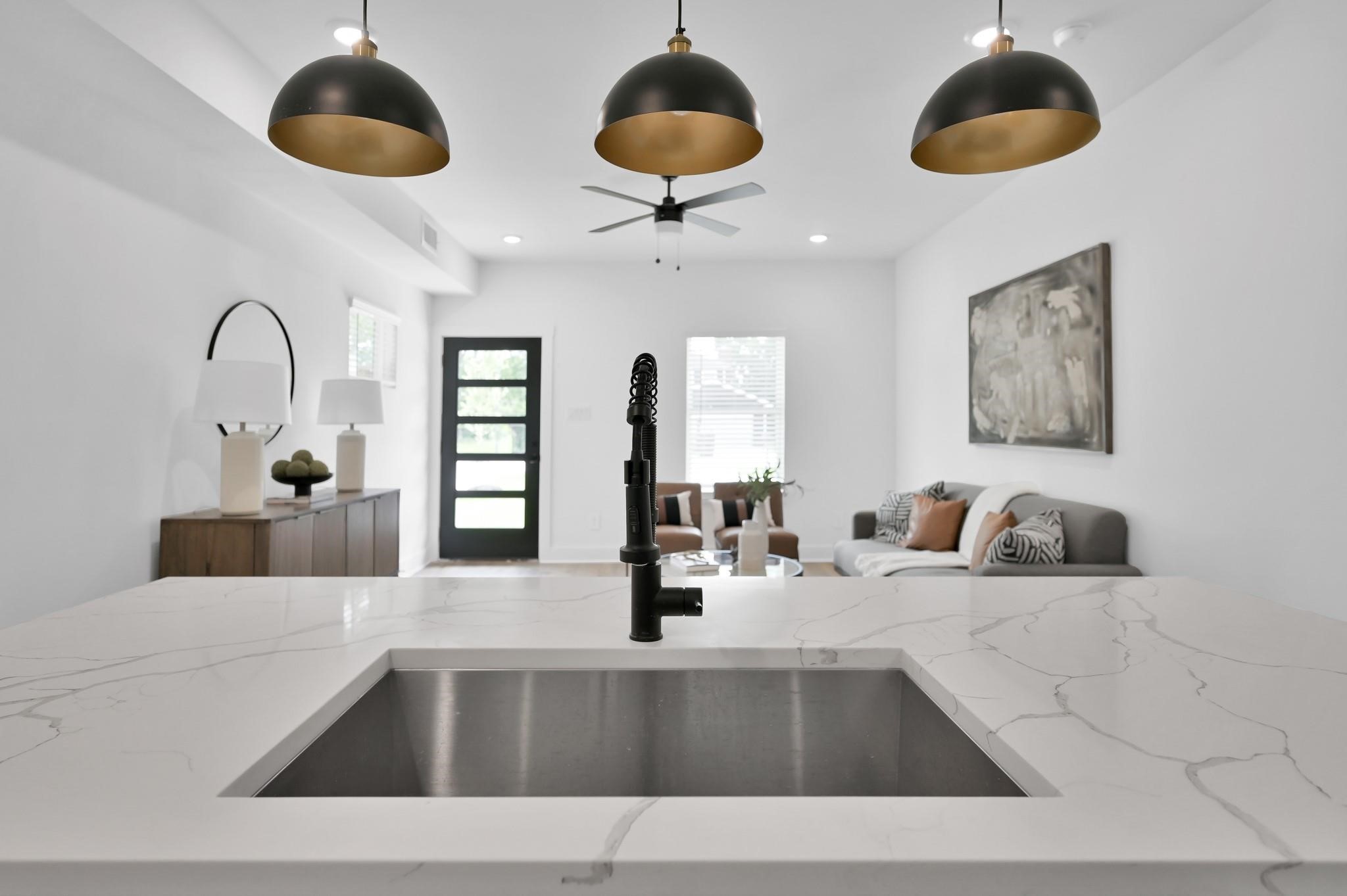 8017 A Cora Street Houston, TX 77088 - Photo 8 of 29 a kitchen with stainless steel appliances granite countertop a sink a counter space and cabinets