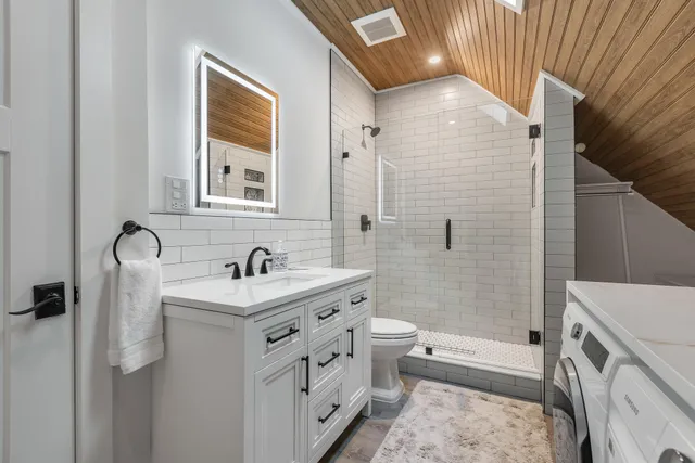 a utility room with dryer and washer