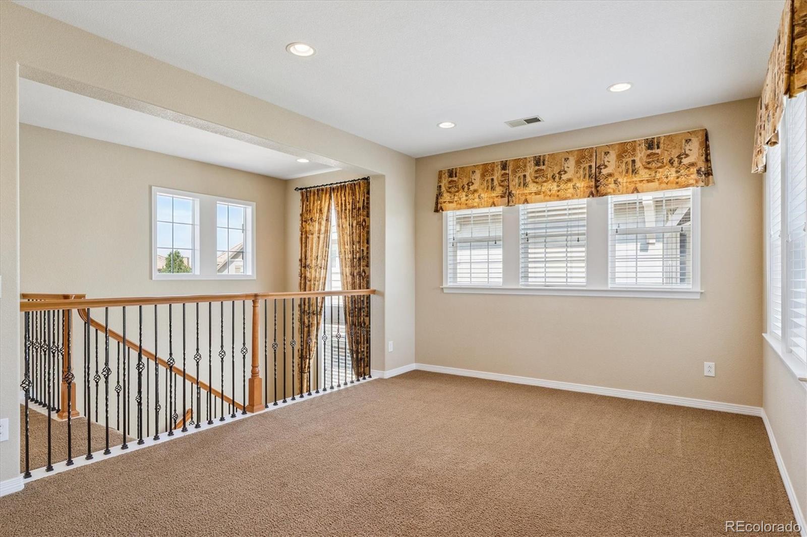 10426 Willowwisp Way Highlands Ranch, CO 80126 - Photo 19 of 47 a view of an empty room with a window