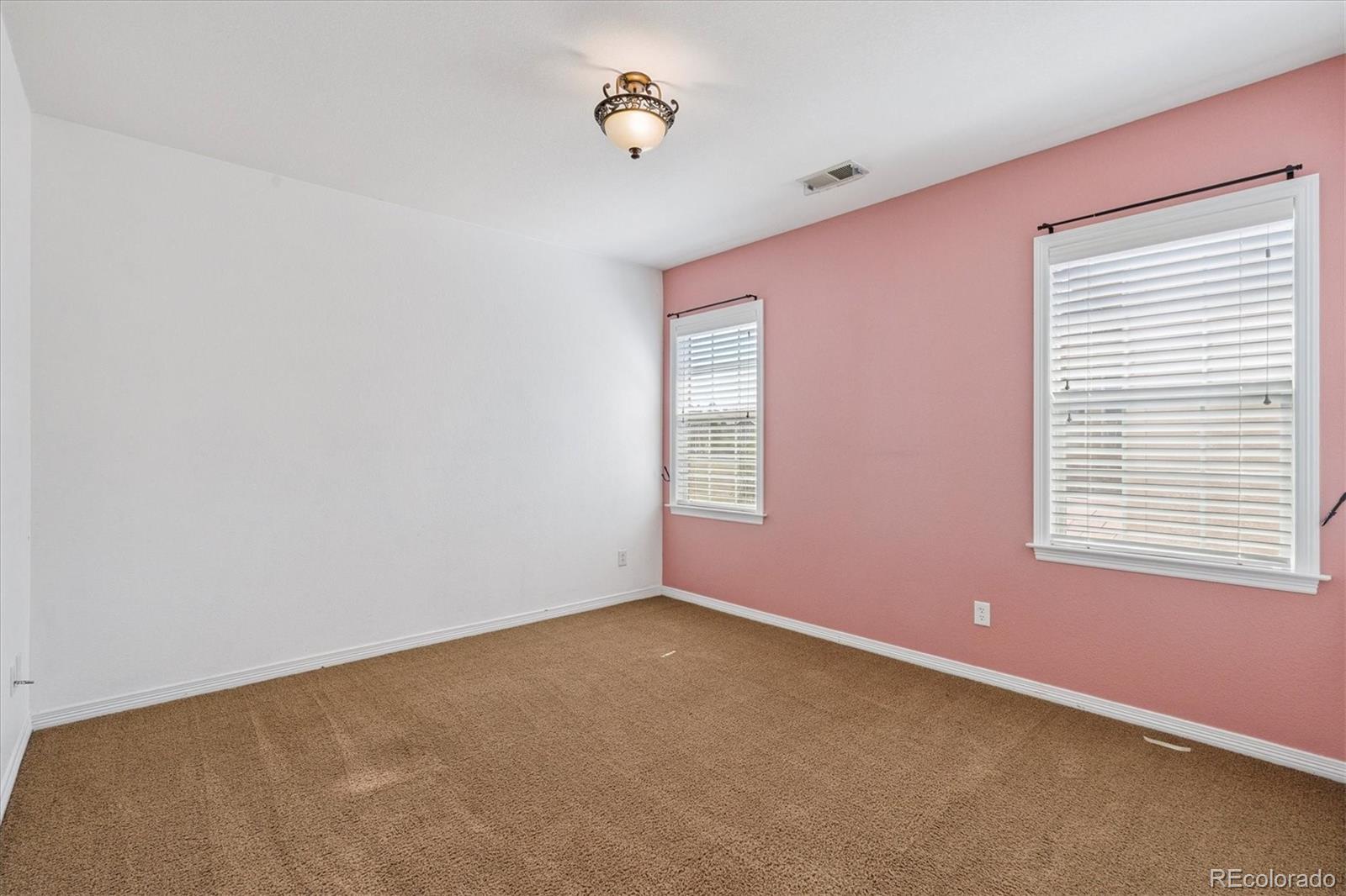 10426 Willowwisp Way Highlands Ranch, CO 80126 - Photo 29 of 47 an empty room with a window