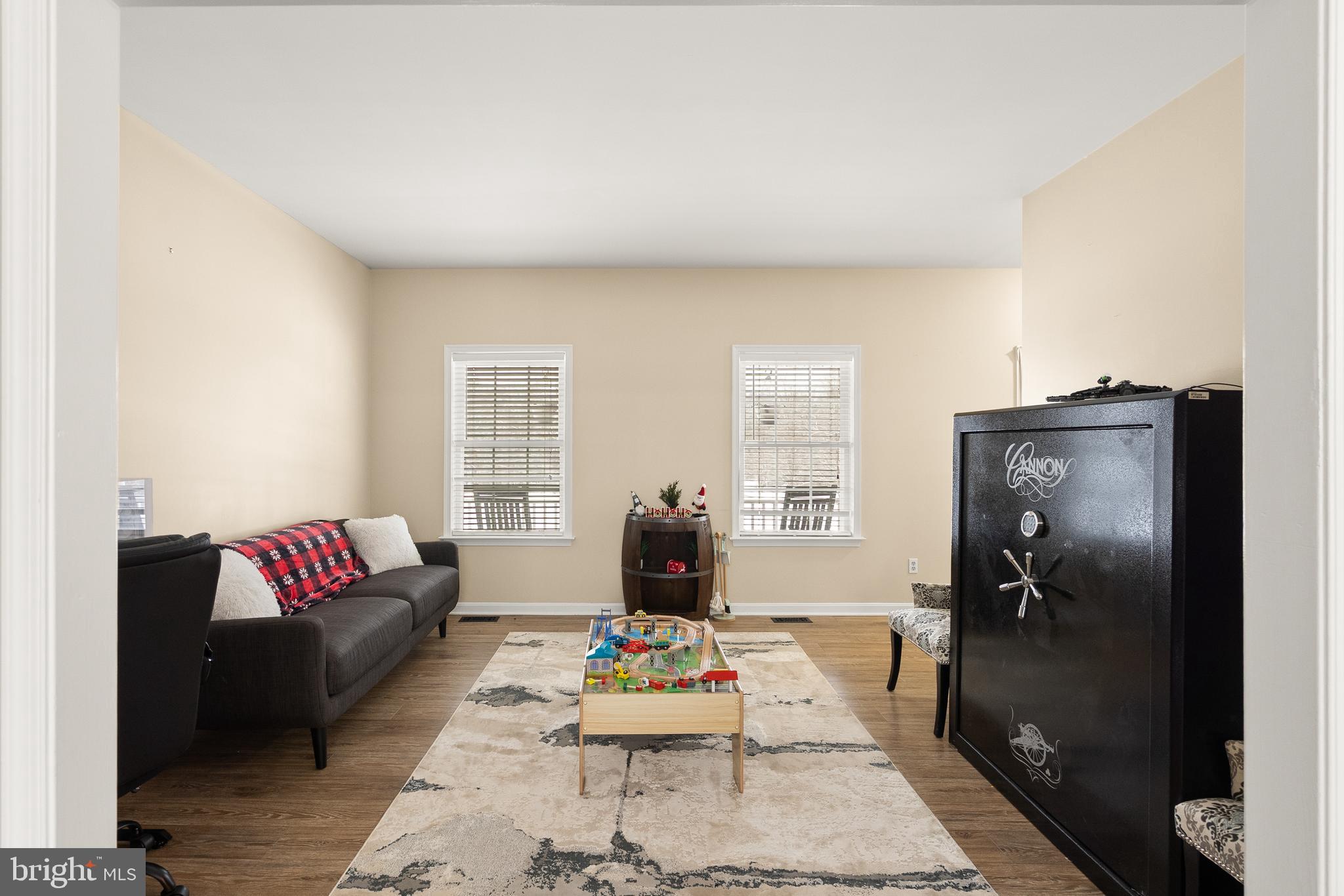 10757 Shenandoah Path Catlett, VA 20119 - Photo 21 of 55 a living room with furniture and wooden floor