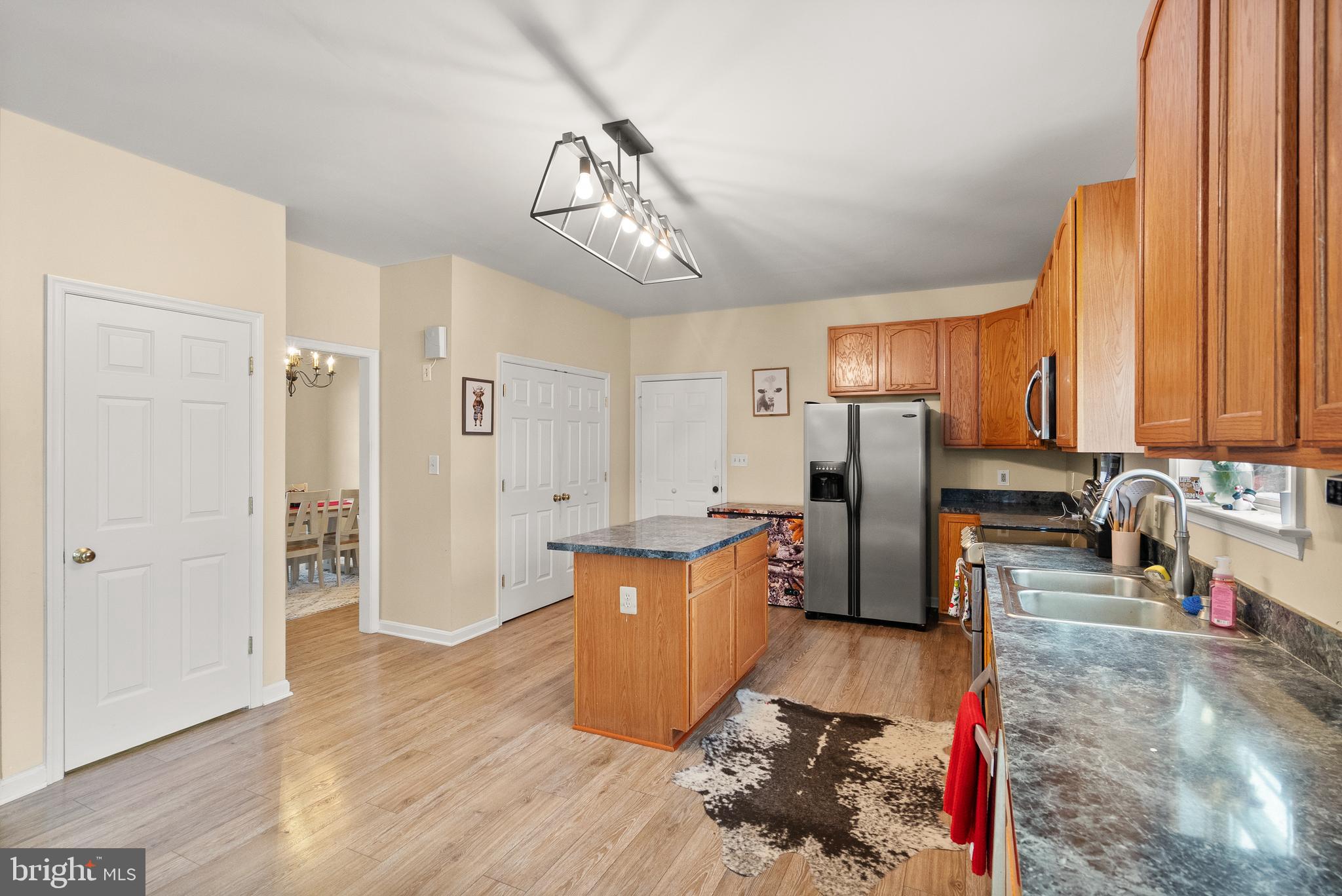 10757 Shenandoah Path Catlett, VA 20119 - Photo 29 of 55 a kitchen with stainless steel appliances granite countertop a refrigerator and a sink