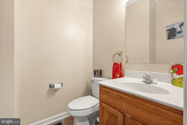 a view of a hallway with a white door