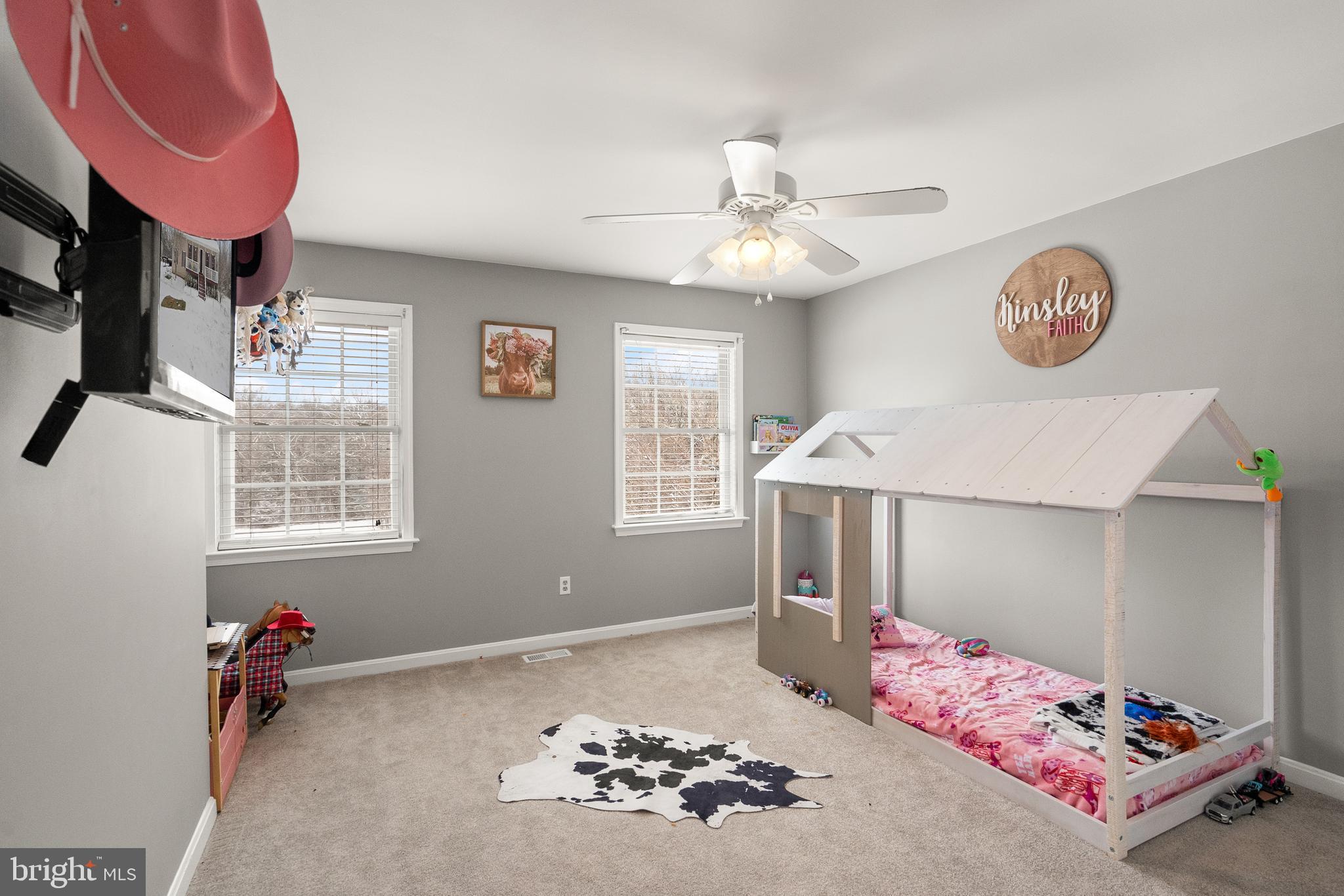 10757 Shenandoah Path Catlett, VA 20119 - Photo 41 of 55 a bedroom with furniture and a chandelier