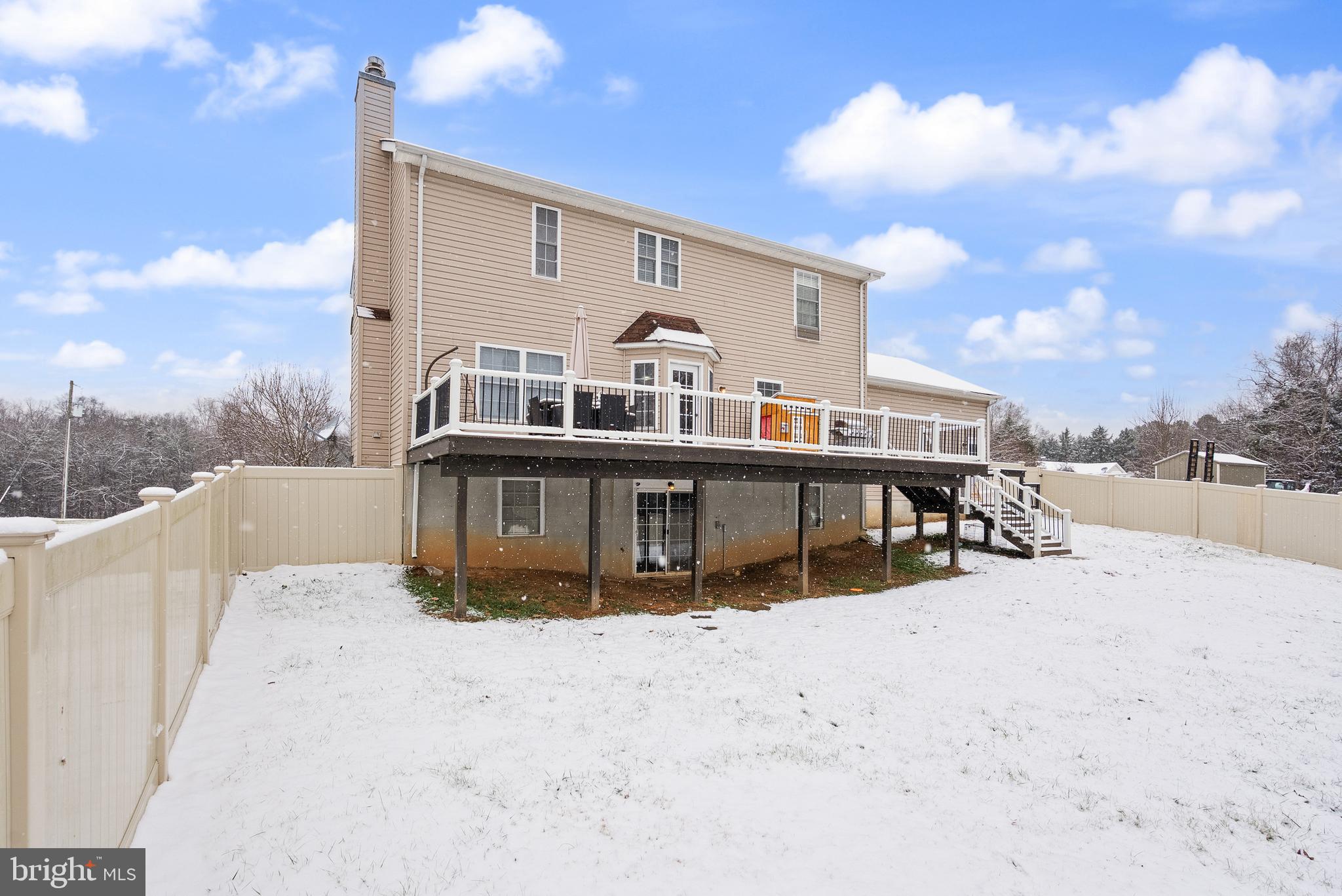 10757 Shenandoah Path Catlett, VA 20119 - Photo 10 of 55 a view of a house with a wooden deck