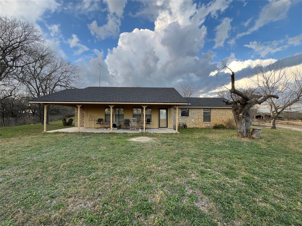 9885 County Road 270 Hico, TX 76457 - Photo 2 of 40 a view of a house with a yard