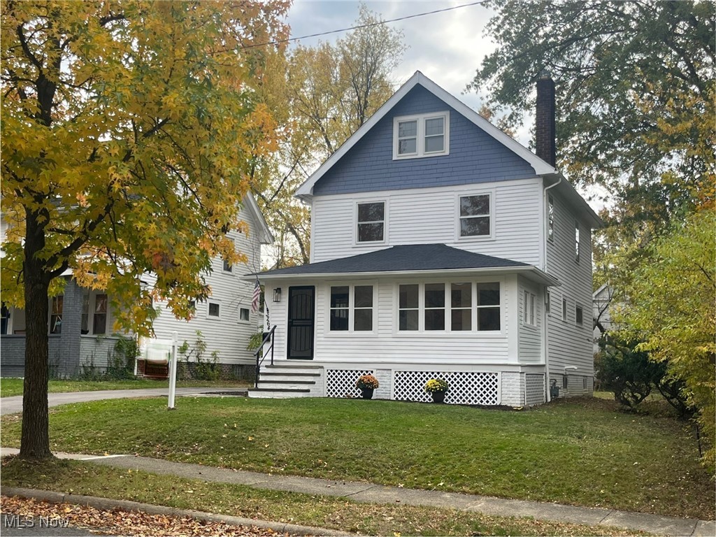 3264 Altamont Road Cleveland, OH 44118 - Photo 1 of 32 Colonial style home featuring a front lawn and enclosed porch.