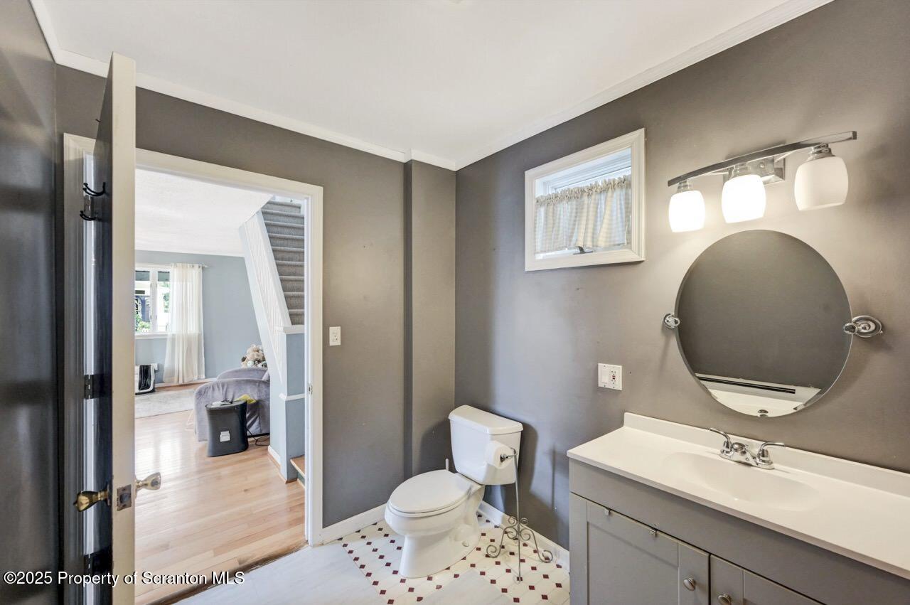 2035 Delaware Street Dunmore, PA 18512 - Photo 17 of 44 a en suite bathroom with a toilet sink and mirror