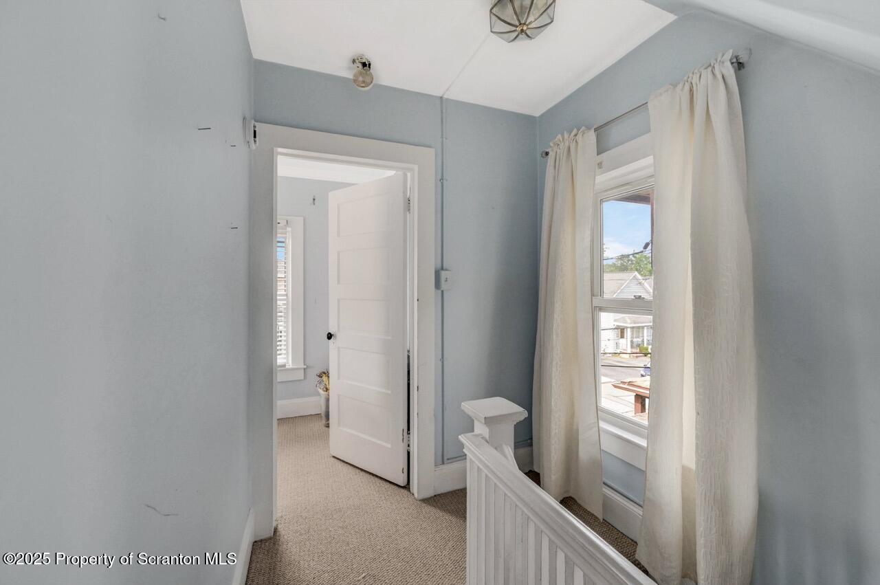 2035 Delaware Street Dunmore, PA 18512 - Photo 18 of 44 a view of a bathroom from a hallway