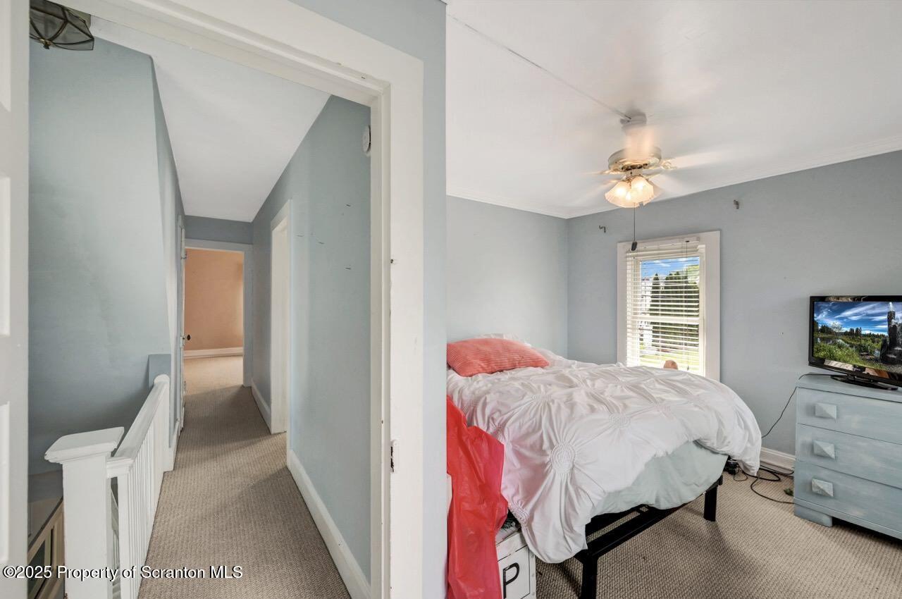 2035 Delaware Street Dunmore, PA 18512 - Photo 20 of 44 a bedroom with a bed and a window