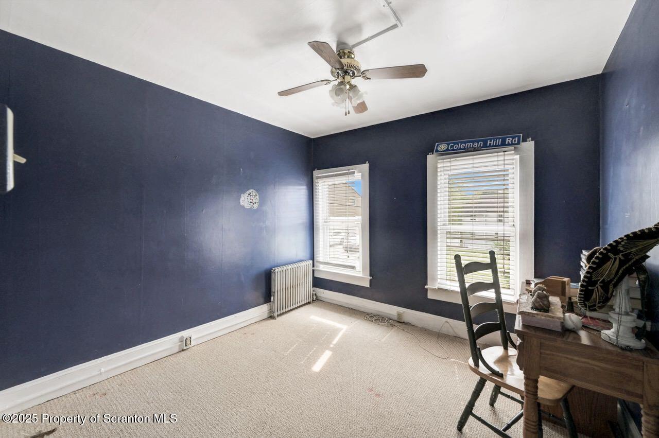 2035 Delaware Street Dunmore, PA 18512 - Photo 25 of 44 a workspace with furniture and windows