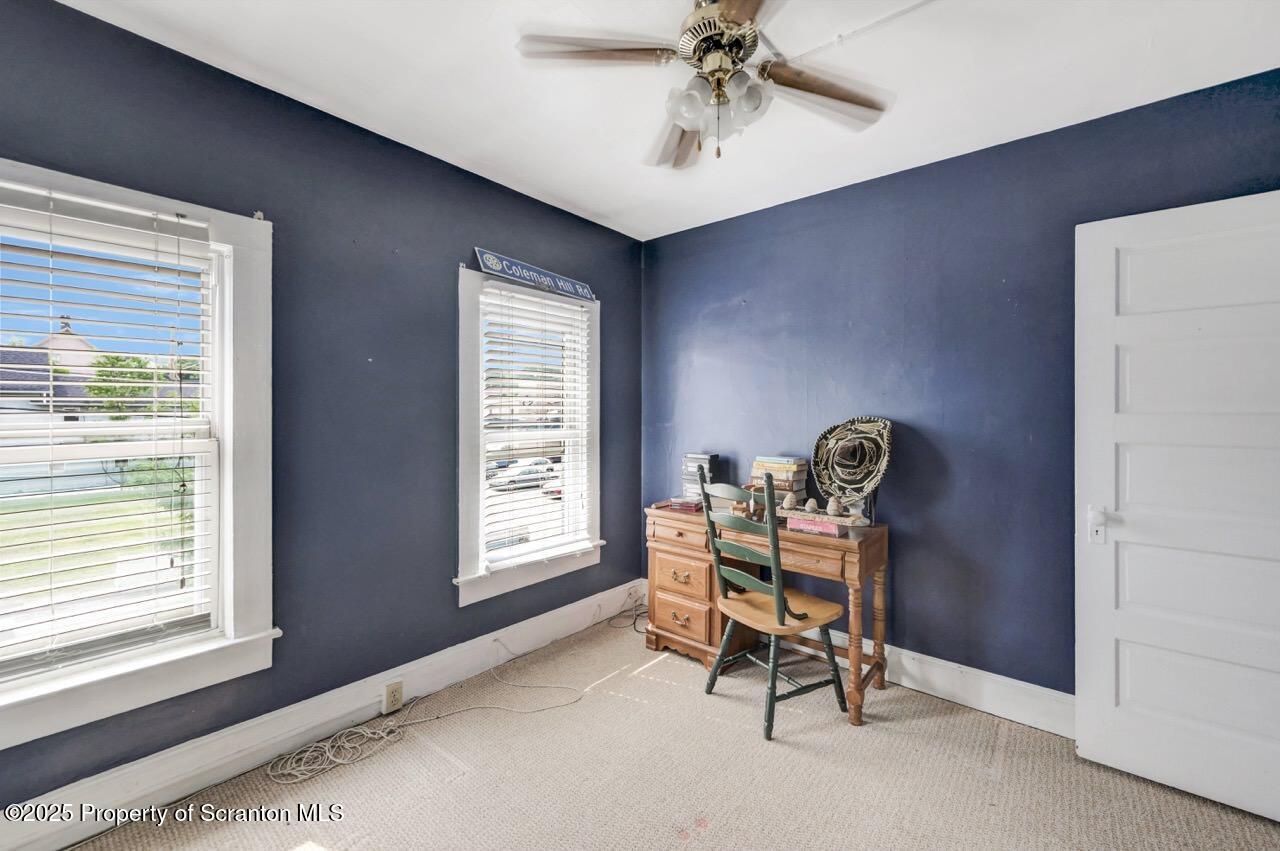 2035 Delaware Street Dunmore, PA 18512 - Photo 26 of 44 a work room with windows and furniture