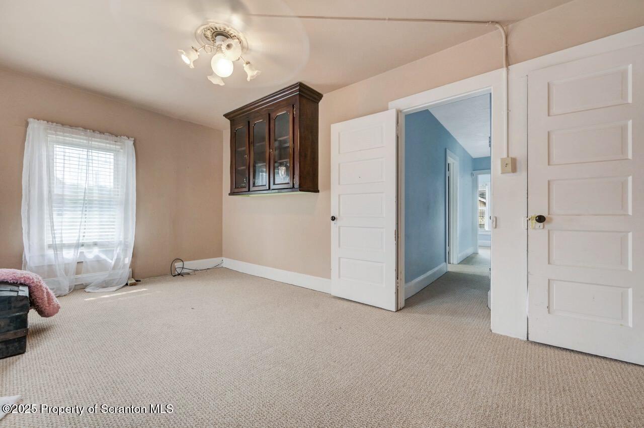 2035 Delaware Street Dunmore, PA 18512 - Photo 29 of 44 a view of an empty room with a window