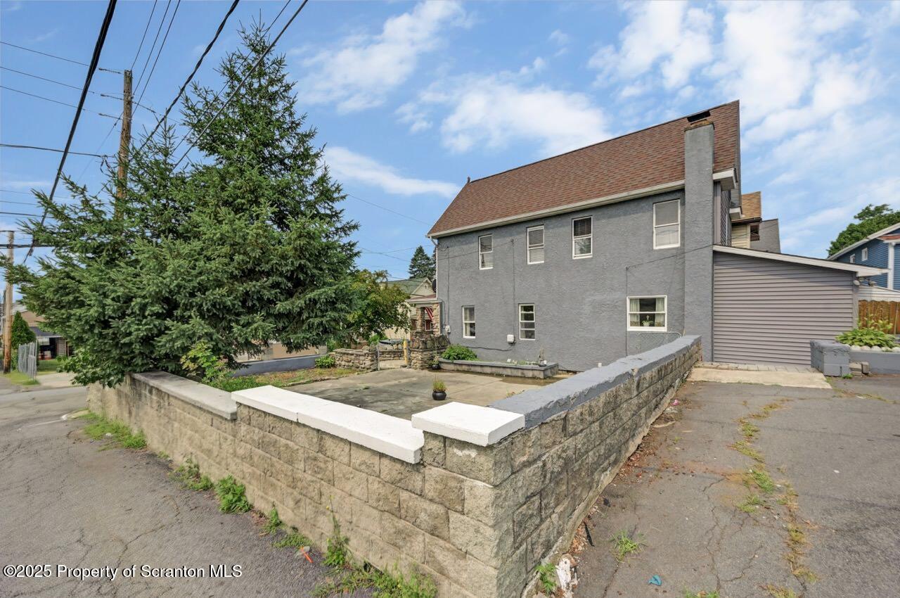 2035 Delaware Street Dunmore, PA 18512 - Photo 40 of 44 a view of a house with pool and yard