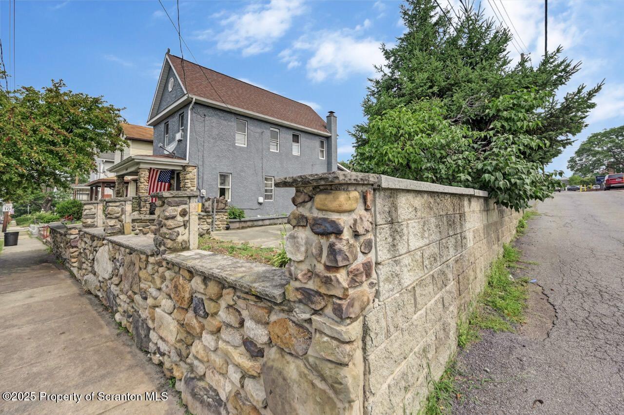 2035 Delaware Street Dunmore, PA 18512 - Photo 41 of 44 a view of house with backyard and seating space