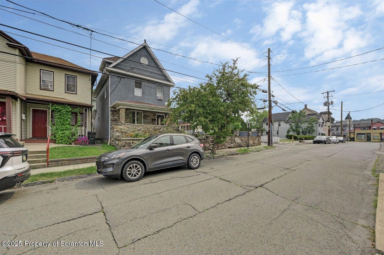 2035 Delaware Street Dunmore, PA 18512 - Photo 44 of 44 a car parked in front of a house